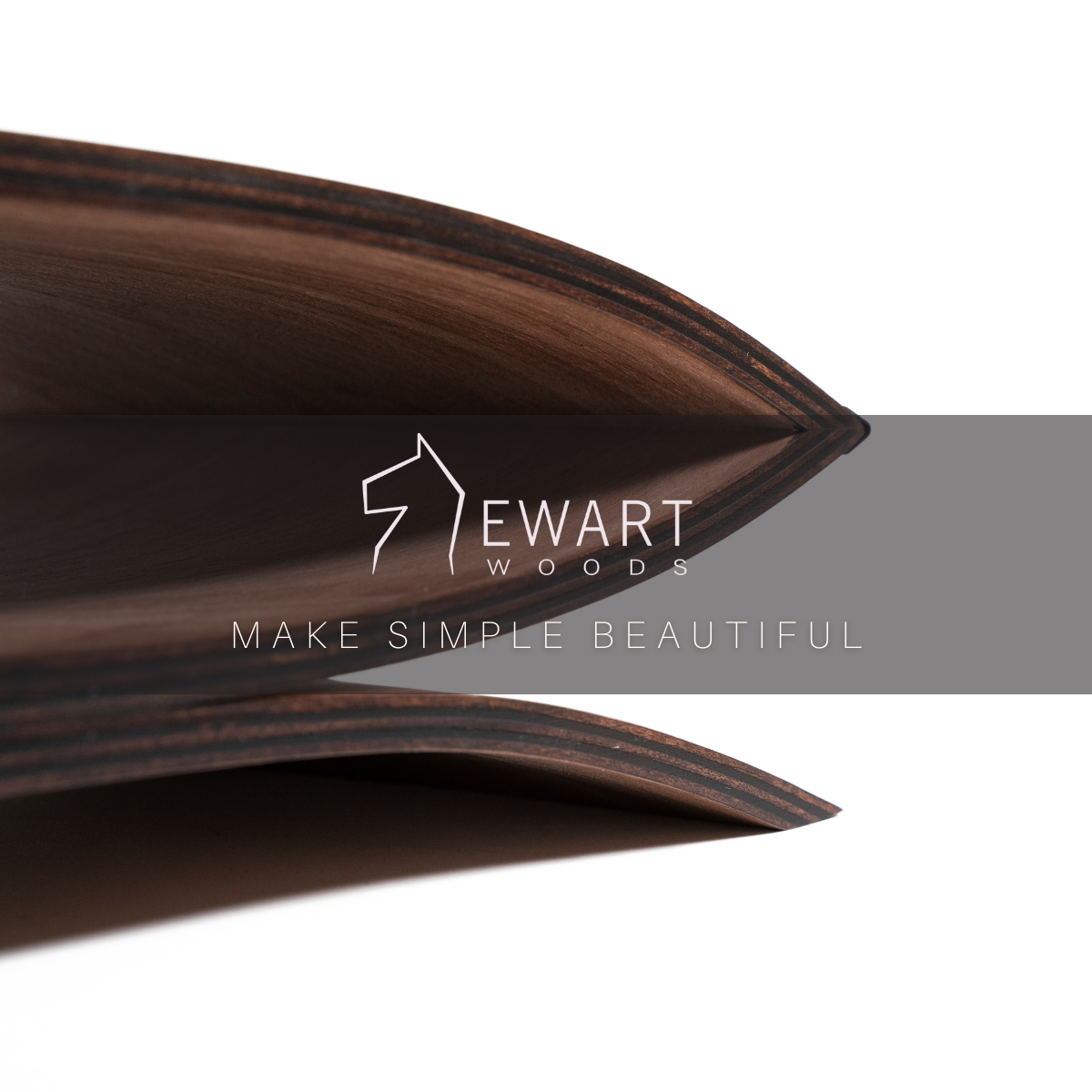Close-up of wooden monitor stand for desk by EWART WOODS