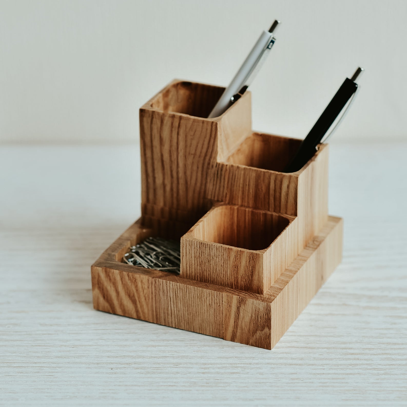 desk organizers, laptop stands, phone holders, and more, crafted from high-quality wood and metal, perfect for gifting.