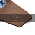 Close-up of wooden wall-mounted corner shelf