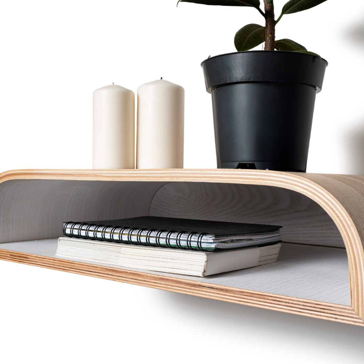 Floating nightstand with white interior and no visible screw system