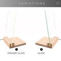 Two variations of a display stand with wooden bases: one with an organic glass panel on the left and the other with a regular glass panel on the right. Both panels are inserted into the wooden base.
