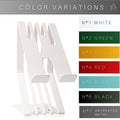 Modern white metal phone stand featuring a grooved design with a charging slot, shown next to a palette of color options including white, green, yellow, red, blue, black, and raw metal.