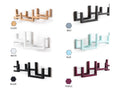 A selection of wooden wall-mounted toilet paper holders in different colors: Clear, Grey, White, Blue, Black, and Purple.