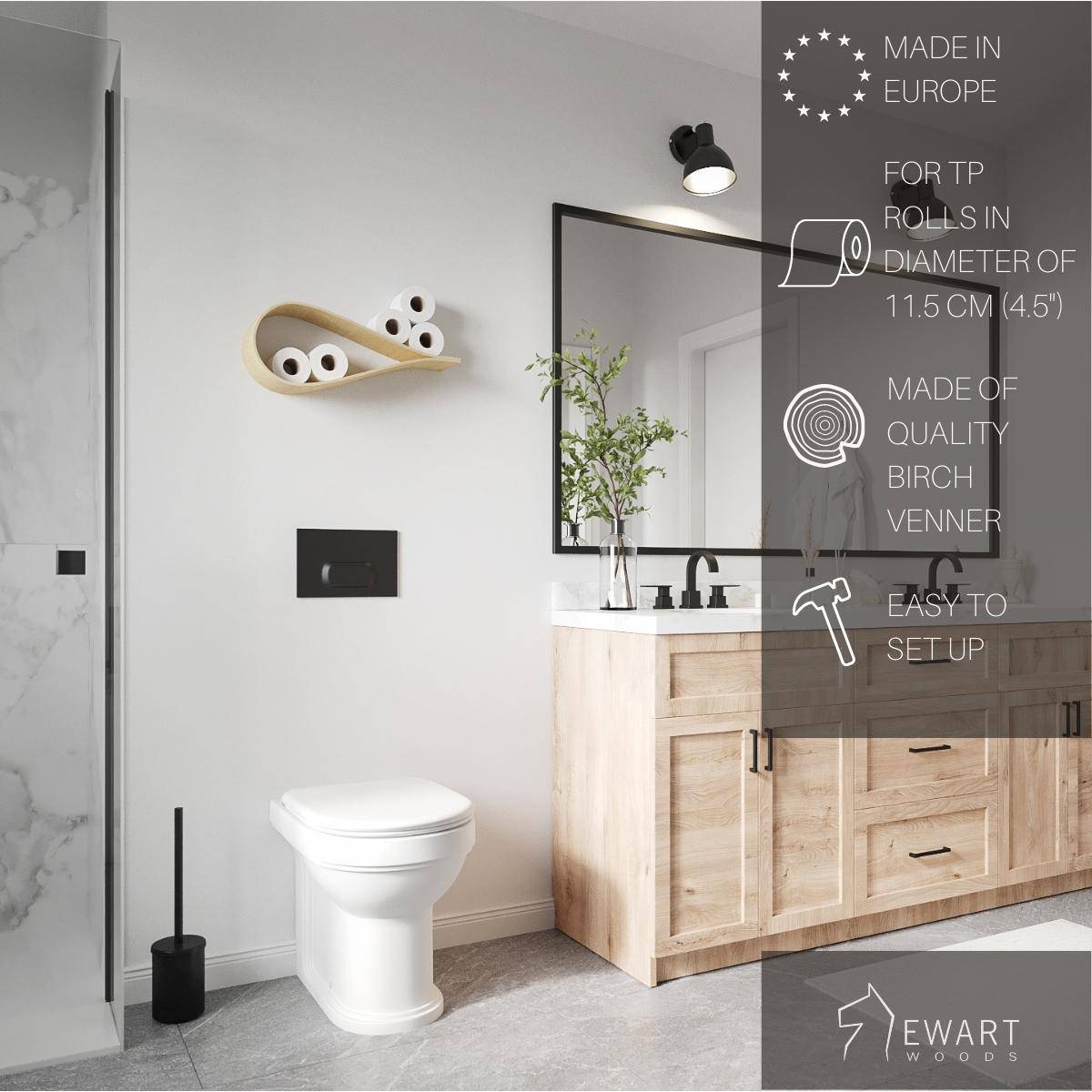 Drop-shaped birch wall shelf holding toilet paper rolls, displayed with text indicating it’s made in Europe, fits 11.5 cm (4.5”) rolls, and is easy to set up. The bathroom features minimalist design with natural wood and modern fixtures.