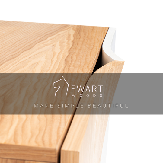 Close-up of wooden buffet cabinet with white door design