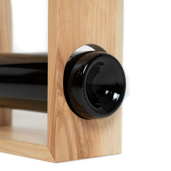 Close-up of wooden wine and glass holder details