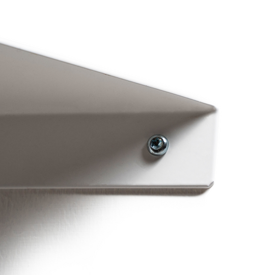Close-up of a white metal shelf corner with a visible screw.