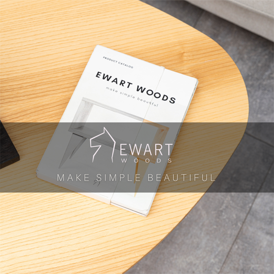 Close-up of small living room table with our brand catalog