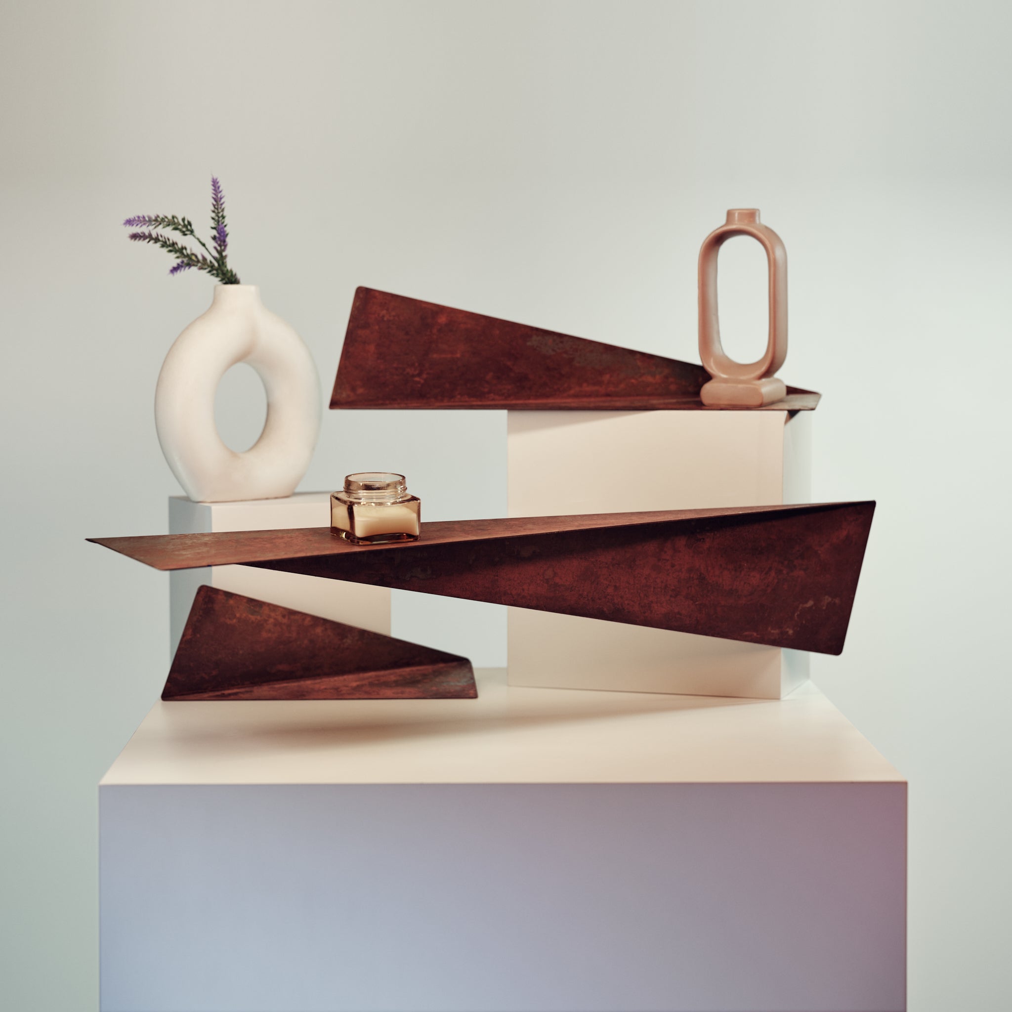 Wall mounted floating set of 3 rusted metal shelves in different dimensions