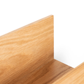 Close-up of wooden wall mounted plant holder