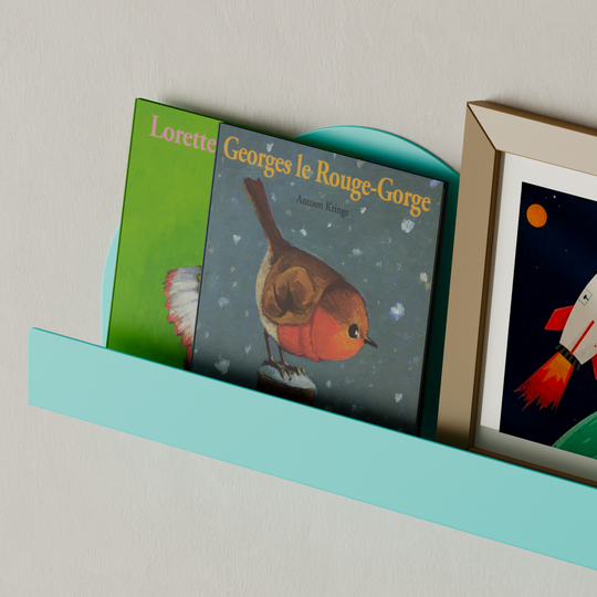 Close- up of childrens wall mounted metal cloud bookshelf in turquoise color