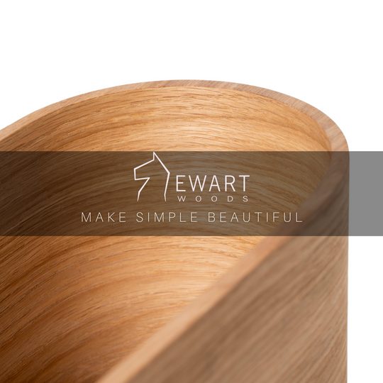 Close-up of wooden wall mounted plant holder by EWART WOODS