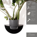Sleek black wall-mounted planter with a powder-coated finish, holding a green plant in a grey pot. Made of high-quality steel and easy to set up.