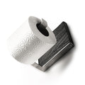 Close-up of a burned ash wood and stainless steel toilet paper holder with a single roll of toilet paper. The design features a sleek metal bar and textured wood