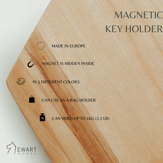 Close-up of a wooden magnetic key holder by Ewart Woods with product features listed, including Made in Europe, Magnet is hidden inside, Available in 3 different colors, Can use as a bag holder, and Can hold up to 1 kg (2.2 lb).