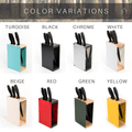 Collection of knife blocks in various colors, including turquoise, black, chrome, white, beige, red, green, and yellow. Each block features a wooden top and base.