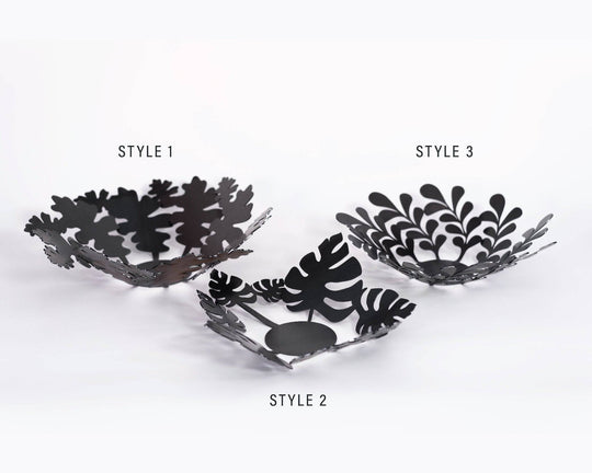 Set of three black metal decorative bowls in different styles with unique leaf and botanical cutout designs, labeled as Style 1, Style 2, and Style 3.