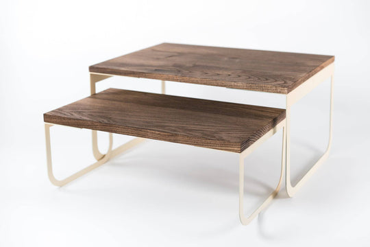 Wooden two-tier tray with light-colored metal legs, set against a white background.