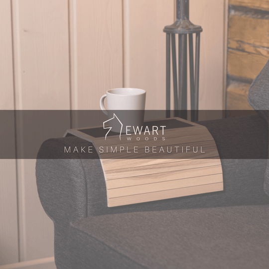 Burned Wooden Sofa Arm Tray Table on a couch arm, showcasing its versatility and stylish burnt wood finish. EWART WOODS