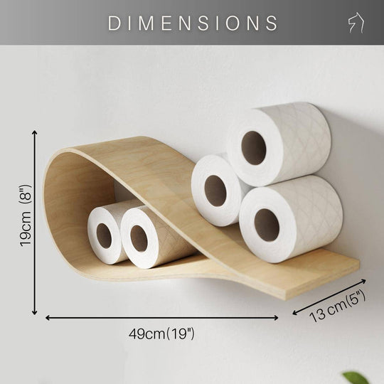 Drop-shaped birch  wall shelf holding toilet paper rolls, displayed with text indicating it’s made in Europe, fits 11.5 cm (4.5”) rolls, and is easy to set up. The bathroom features minimalist design with natural wood and modern fixtures.